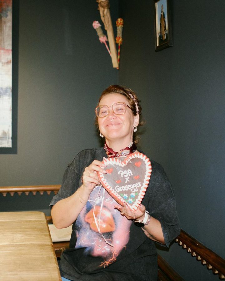 Franziska holding the “PSA × Grasegger” gingerbread heart