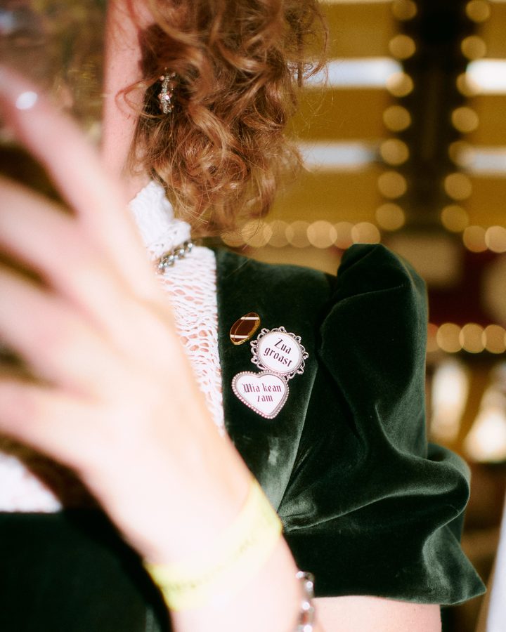 Oktoberfest pins on a velvet dirndl